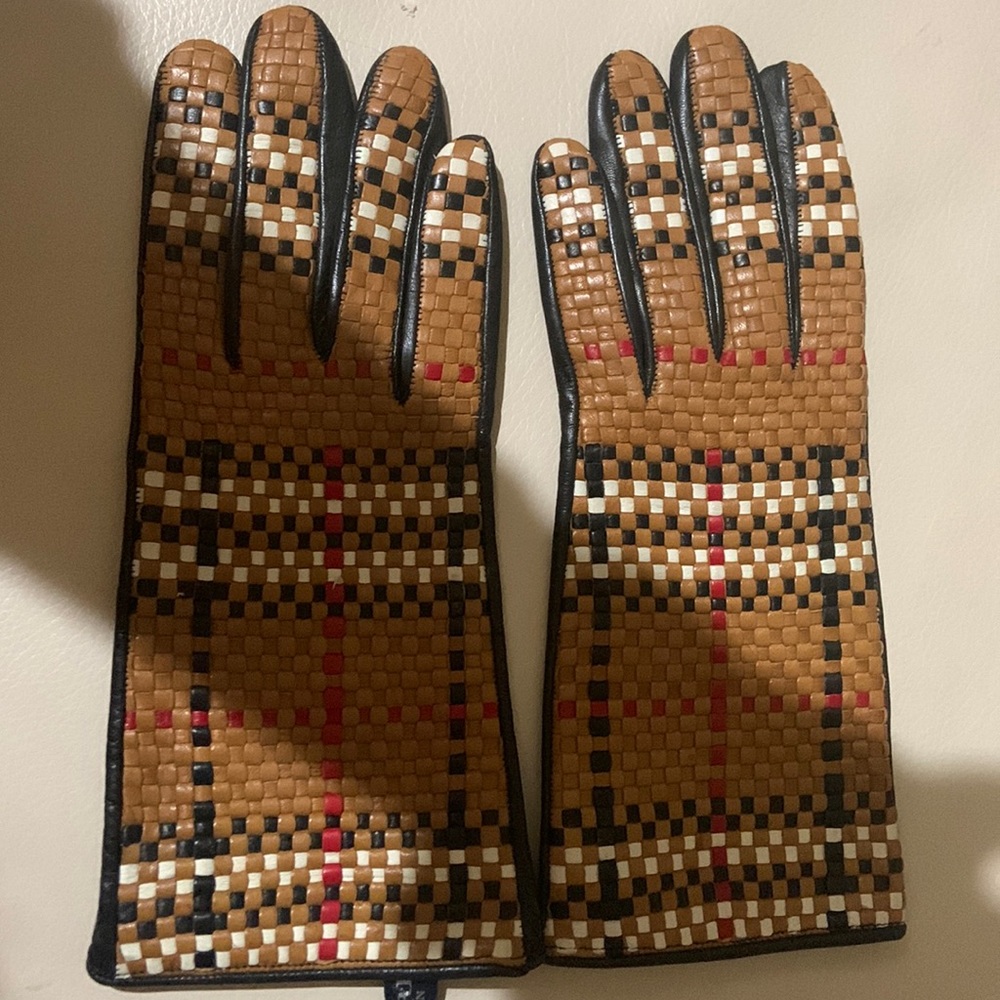 BURBERRY leather gloves. Size 7, woven plaid iconic Burberry pattern.